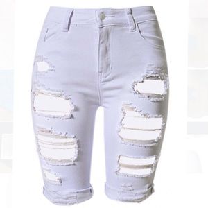 Never Worn: High Waisted Distressed Shorts